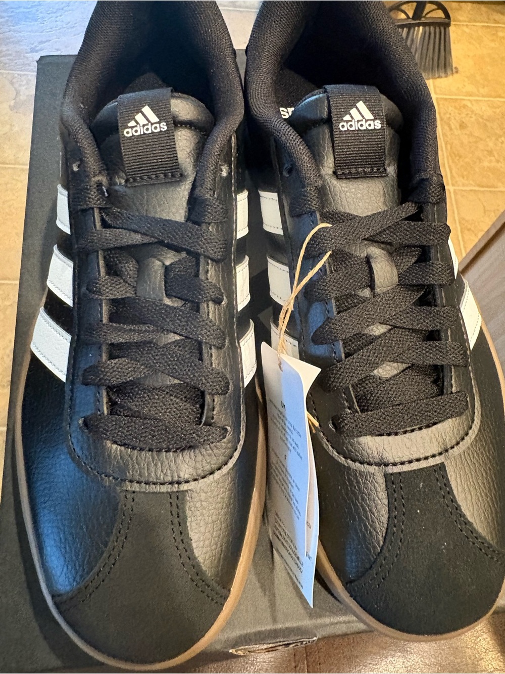 adidas Men’s Black Sneakers with White Stripes